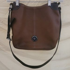 Dooney & Bourke Leather shoulder bag w/ Long adjustable strap. Like new